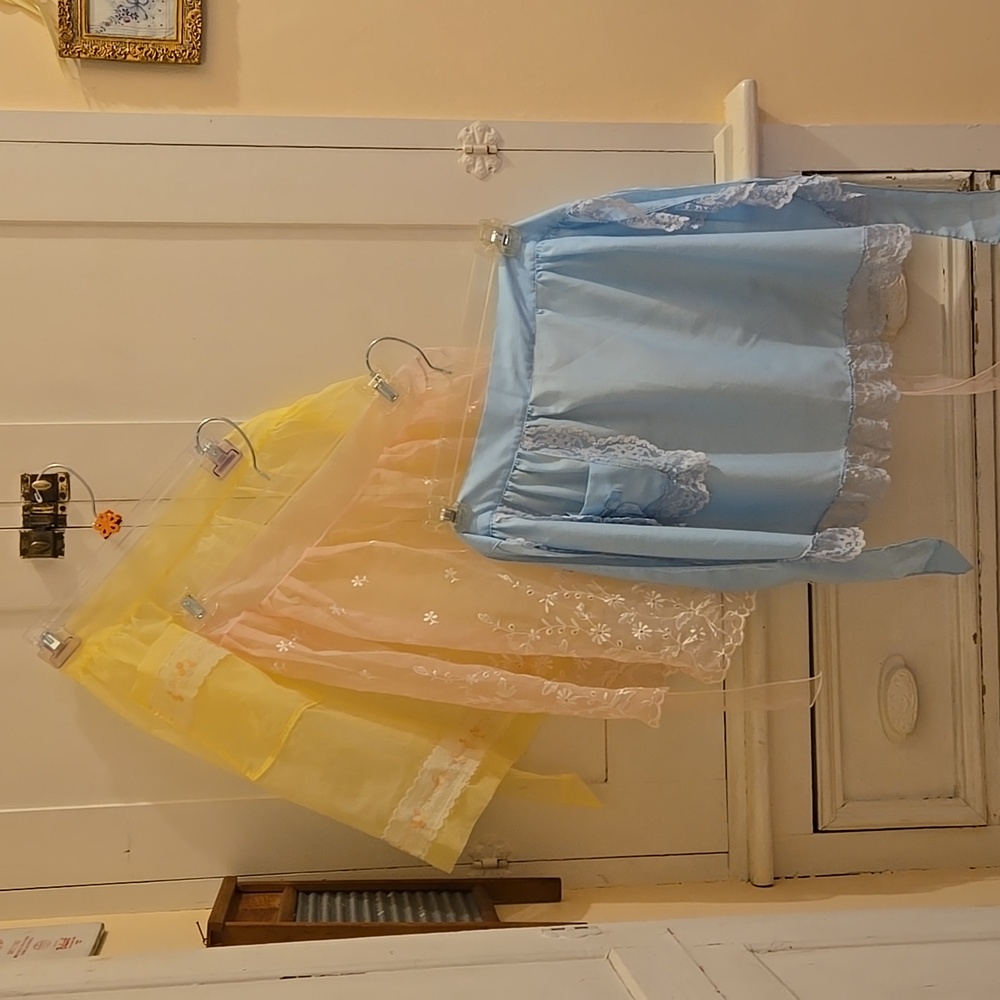 Three vintage aprons